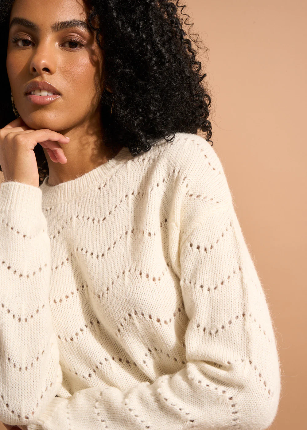Pull col rond avec jeu de points ajourés