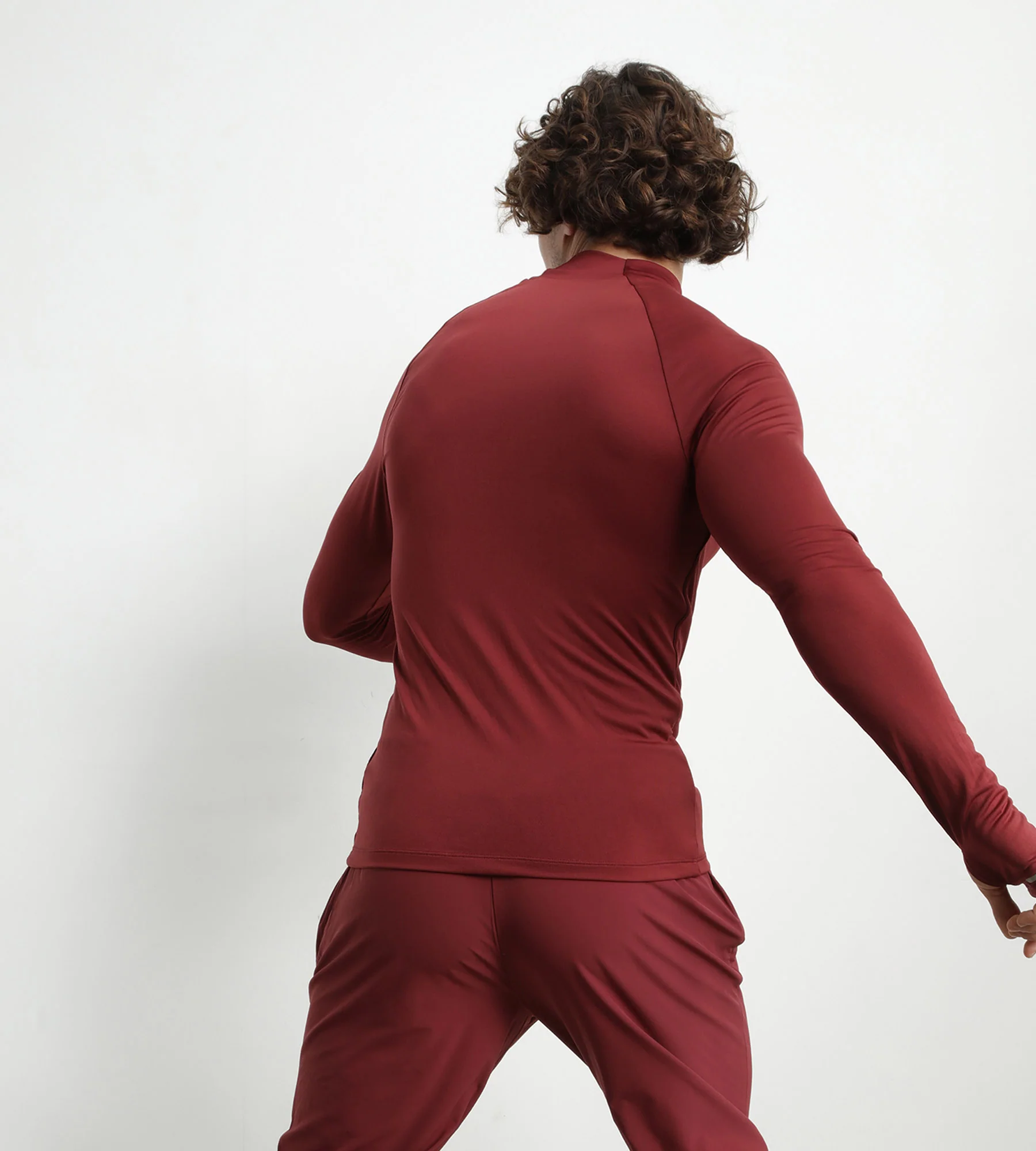 Haut de sport homme à col montant en microfibre Bordeaux Dim Move